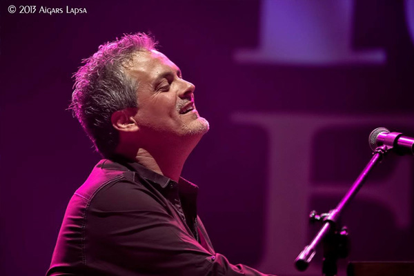 Scottie Miller with Ruthie Foster at The Rawa Blues Festival - Katowice, Poland 2013 - Photo by award winning photographer Aigars Lapsa.